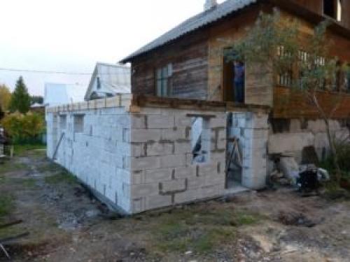 Пристройка к кирпичному дому из пеноблоков: технология строительства